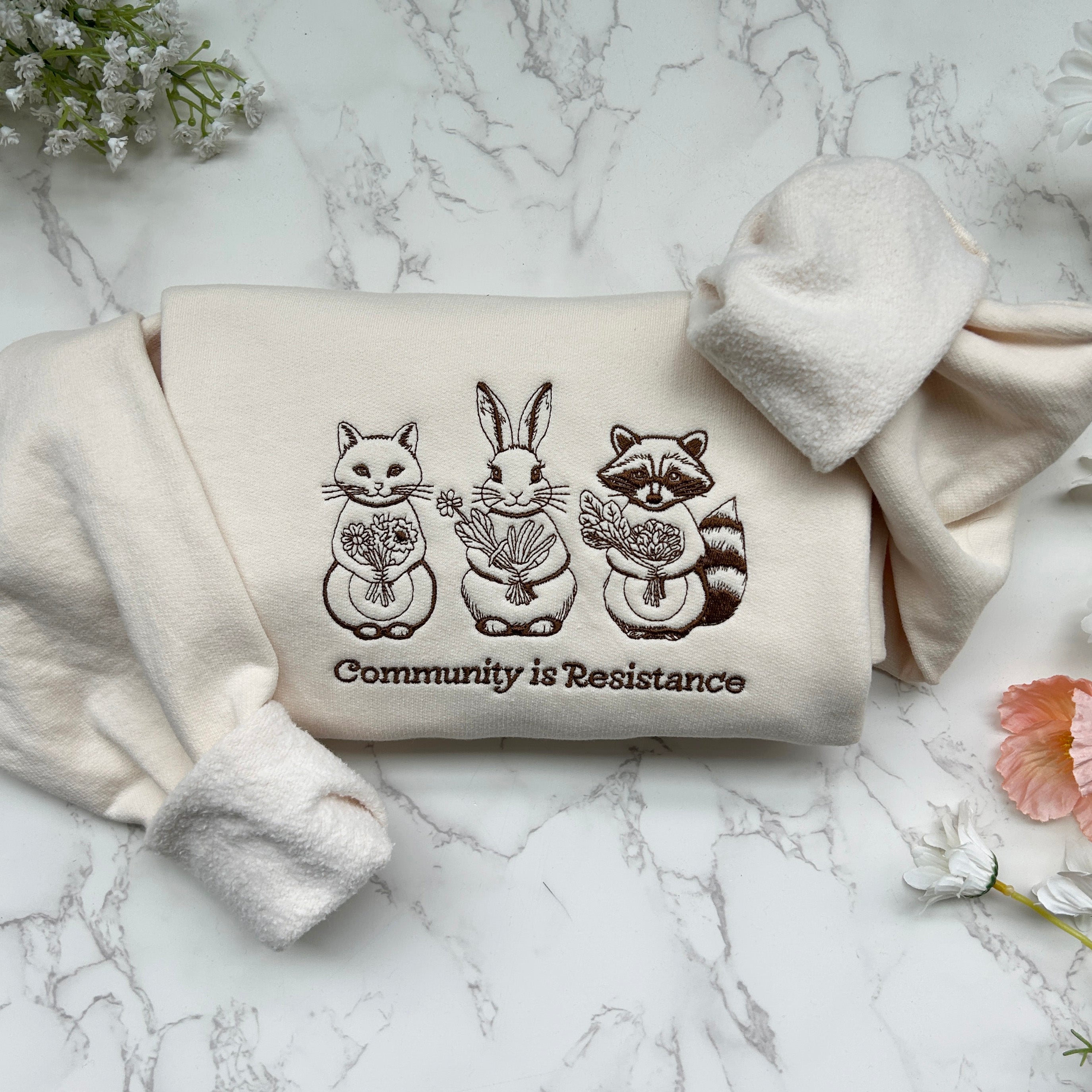 Community is Resistance Embroidered Sweatshirt